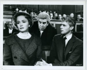 courtroom scene with wife, barrister, and husband