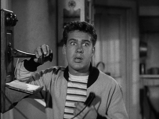 A frightened Jimmy Olson on phone